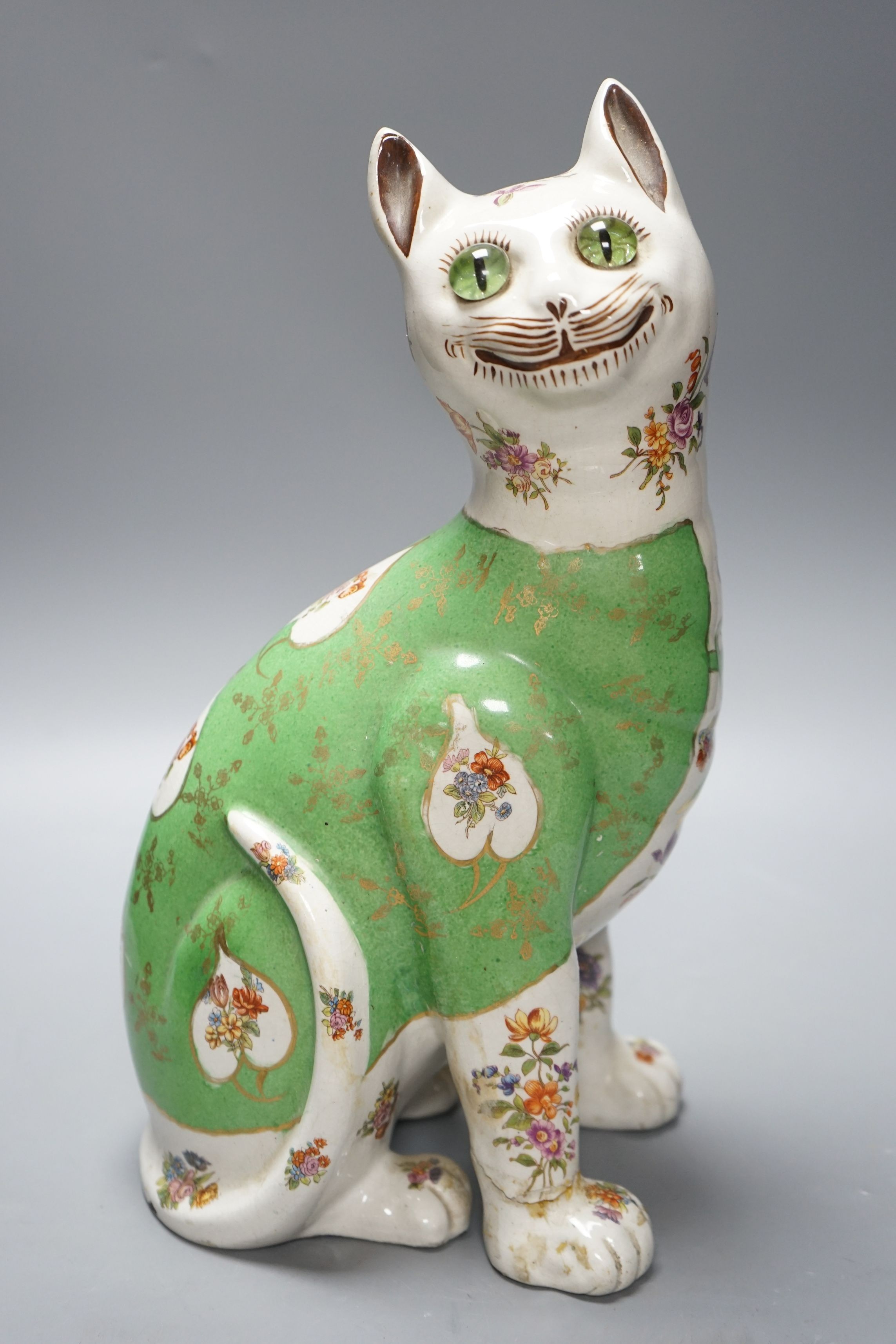 A Galle style polychrome cat, early 20th century, 34cms high